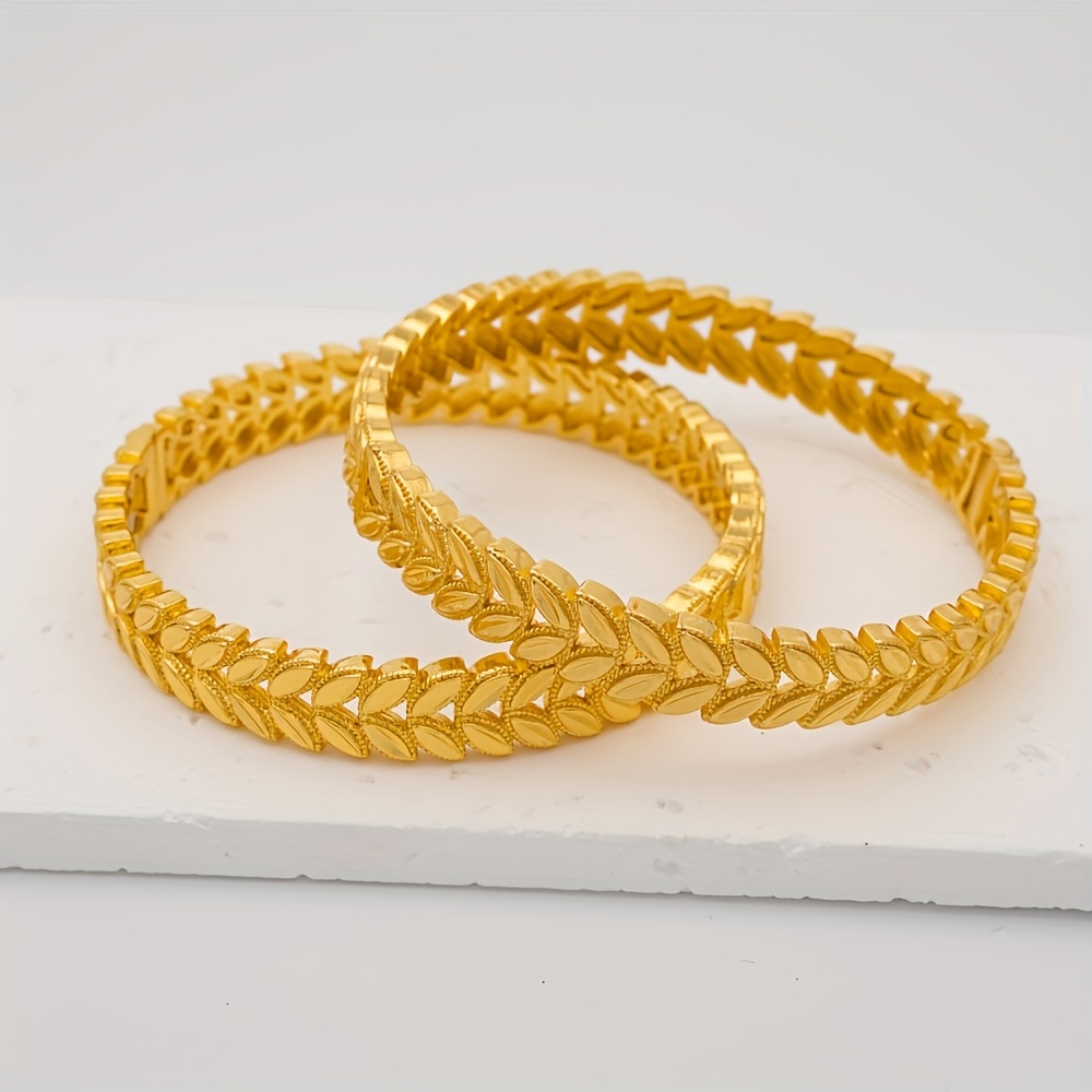 Adjustable Cuff Bracelet with Intricate Leaf Pattern